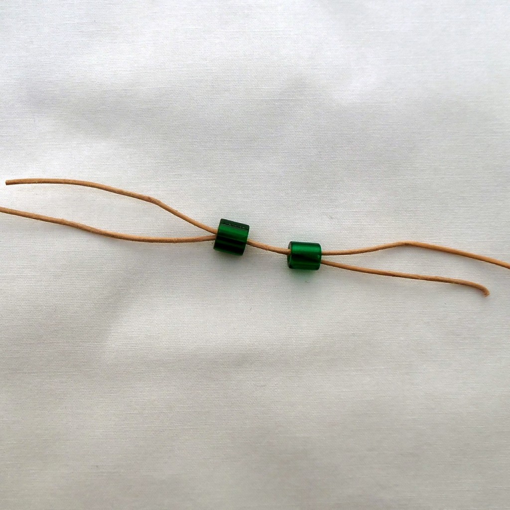 String beads onto other end
