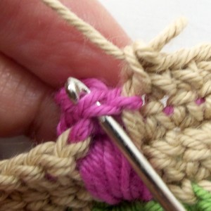 Single crochet into top of rosebud