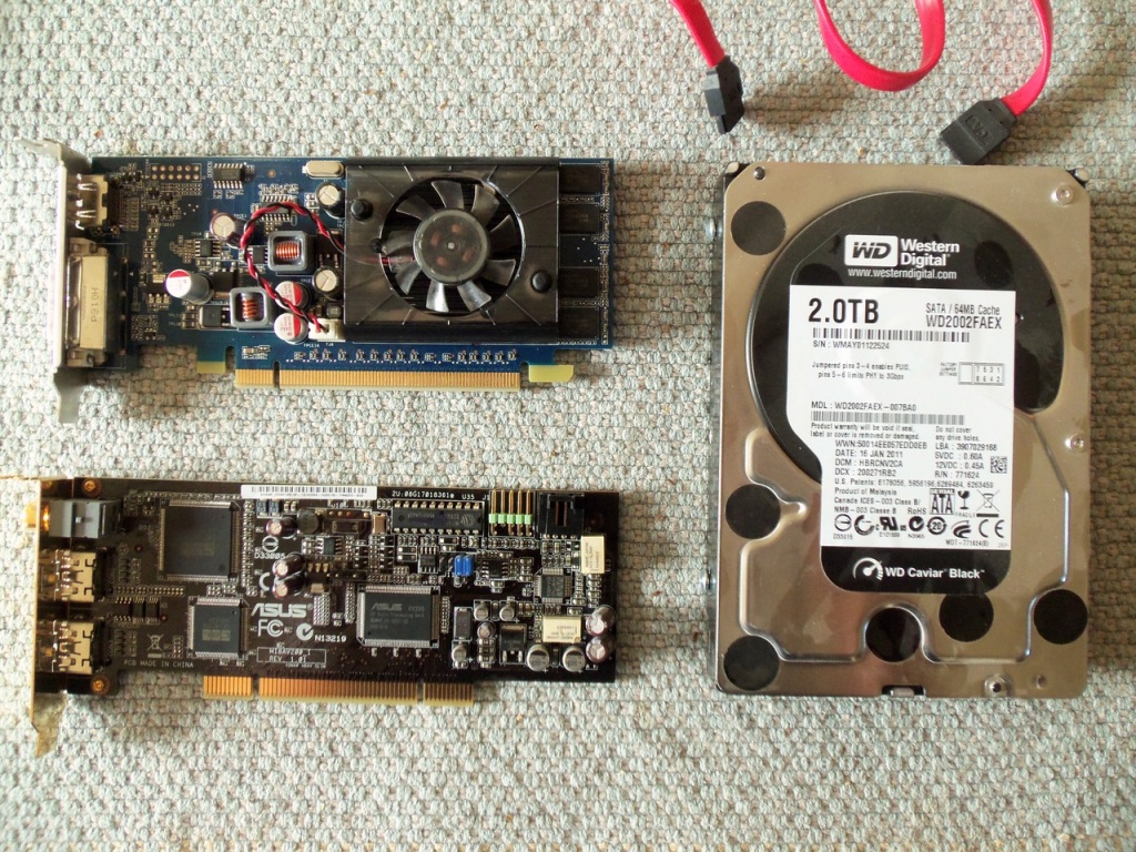 I removed the old video card and a couple other components. To ensure I don't overtax the system with the new GT 730, I stripped out the old surround sound audio card and 2TB media drive I no longer need.
